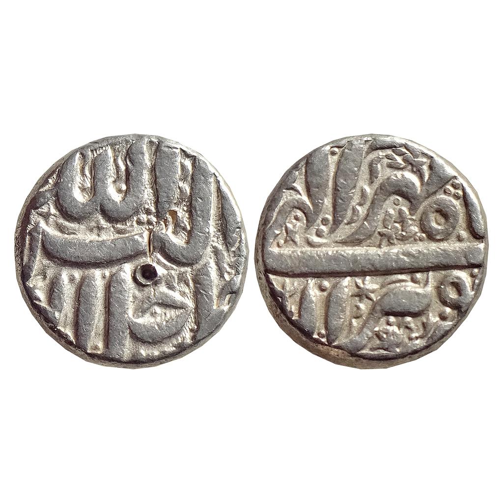 Mughal Akbar  Ilahi Month Mihr Libra a small bird to right under the mint name on rev Berar Mint Silver Rupee